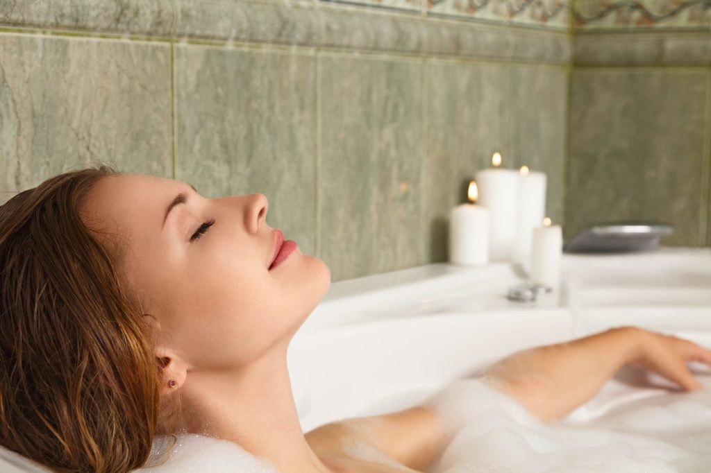 How to fall asleep fast. Woman In Warm Bath Before Bed