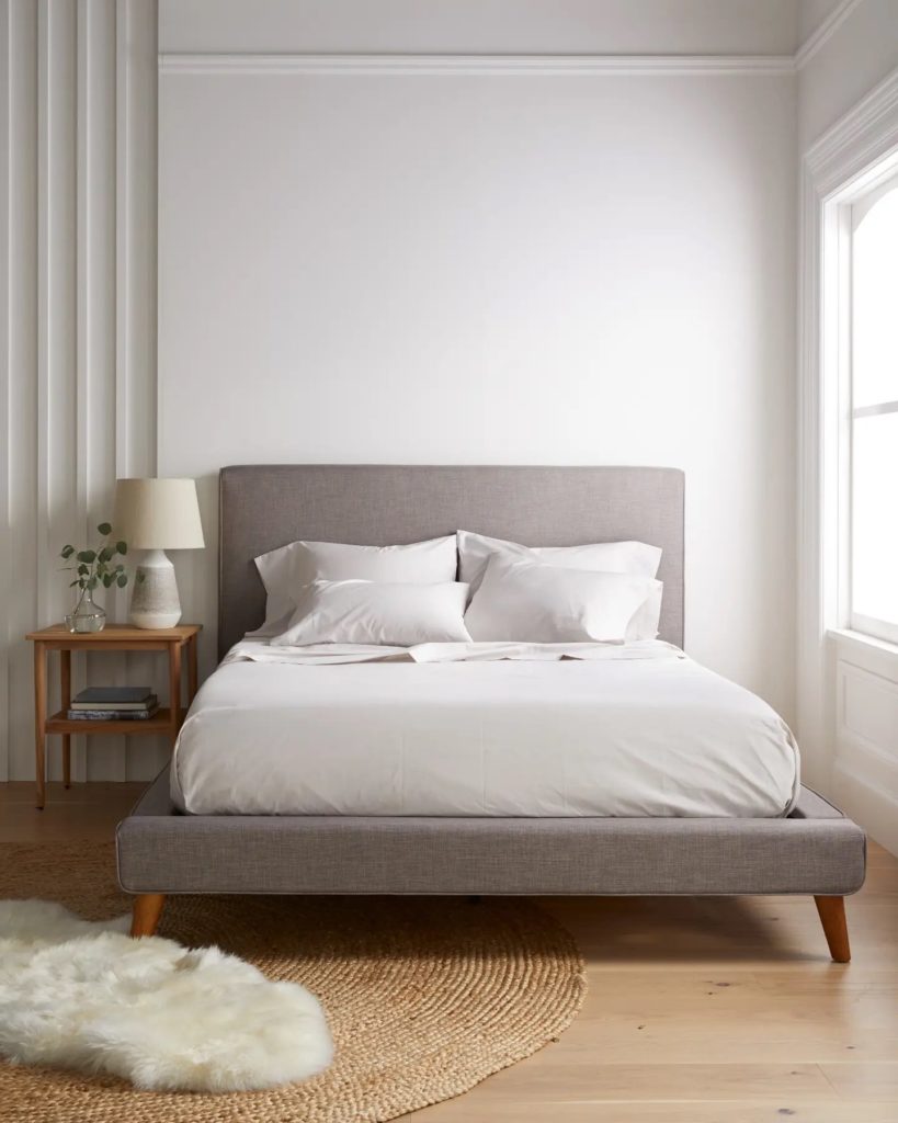 product image of the Quince Organic Cotton Percale Sheet Set staged in a bedroom