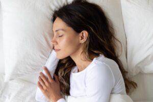 stock photo of a young woman sleeping peacefully